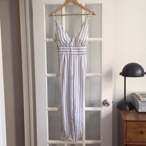 Black and gray stripped jumpsuit with pockets